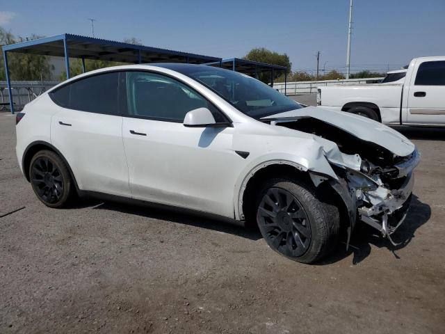 Photo 4 from auction – 2022 TESLA MODEL Y with VIN 7SAYGDEE7NF355835