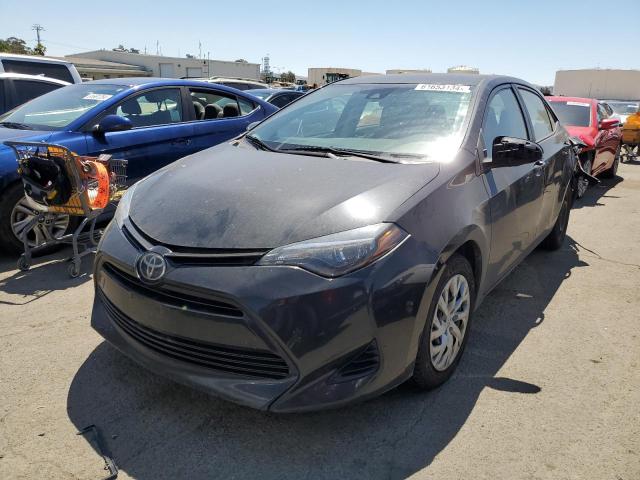 TOYOTA COROLLA L 2018 with VIN 5YFBURHE9JP819596 - Photo from auction