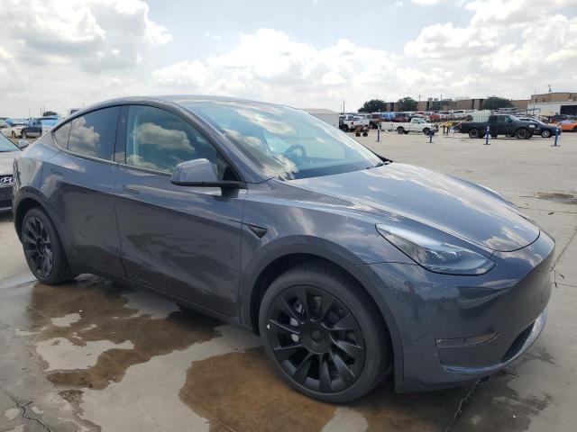 Photo 4 from auction – 2023 TESLA MODEL Y with VIN 7SAYGDEE2PA171757