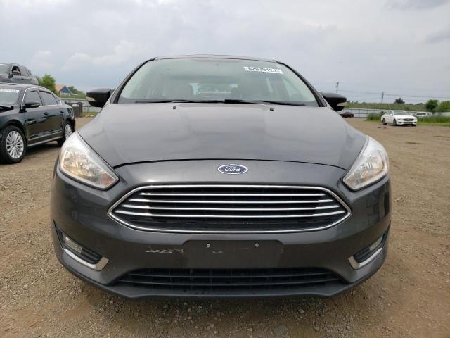 Foto 5 de la subasta – 2018 FORD FOCUS con VIN 1FADP3N27JL249670