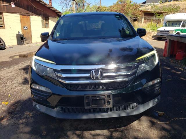 Photo 5 from auction – 2016 HONDA PILOT EX with VIN 5FNYF5H36GB059837