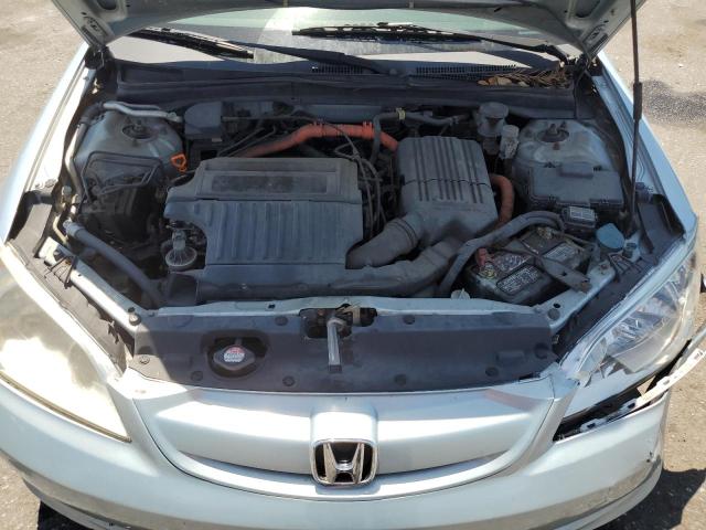 Photo 11 from auction – 2004 HONDA CIVIC HYBR with VIN JHMES95694S002808