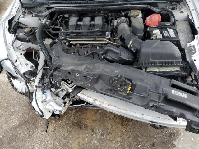 Photo 11 from auction – 2015 FORD TAURUS SEL with VIN 1FAHP2E85FG138843