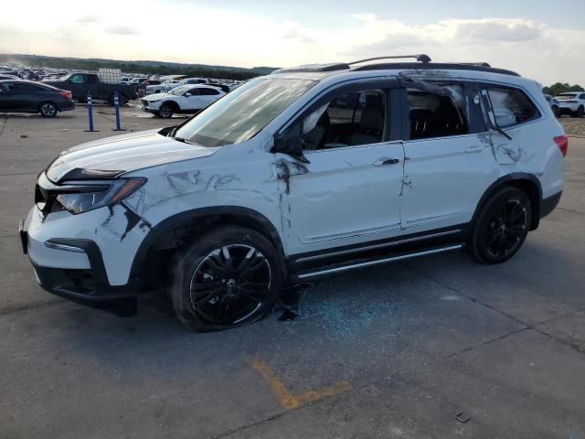 HONDA PILOT SE 2022 with VIN 5FNYF6H2XNB099123 - Photo from auction