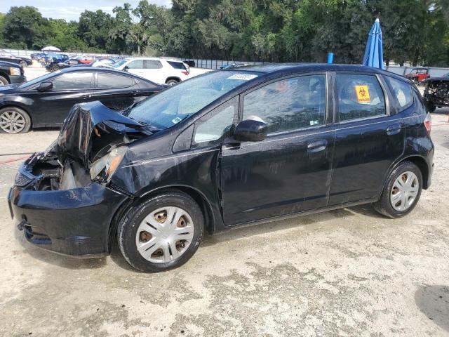 HONDA FIT 2011 with VIN JHMGE8H35BS010977 - Photo from auction