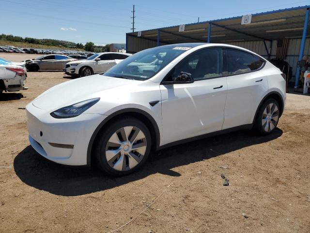 TESLA MODEL Y 2023 with VIN 7SAYGDEE4PA034142 - Photo from auction