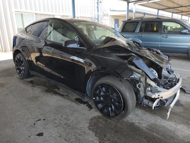Photo 4 from auction – 2023 TESLA MODEL Y with VIN 7SAYGDEE4PF626076