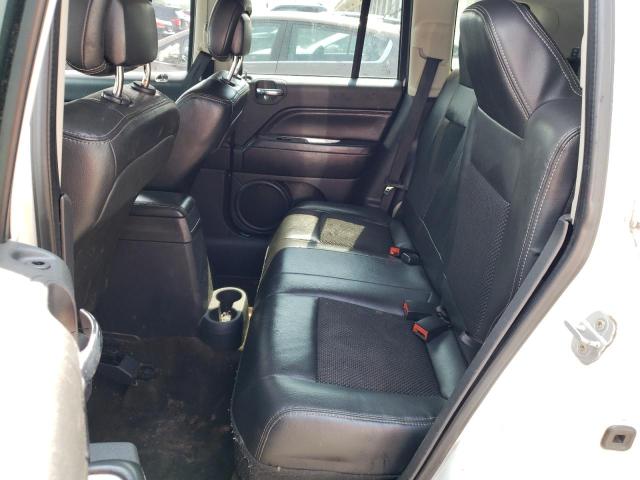 Photo 11 from auction – 2014 JEEP COMPASS LA with VIN 1C4NJCEB8ED518212