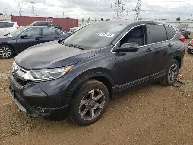 HONDA CR-V EX 2018 with VIN 7FARW2H57JE084634 - Photo from auction