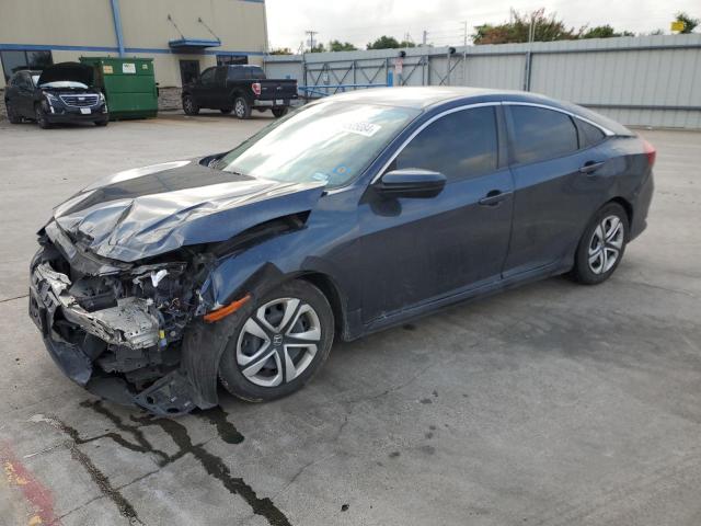 HONDA CIVIC LX 2018 with VIN 19XFC2F68JE039971 - Photo from auction
