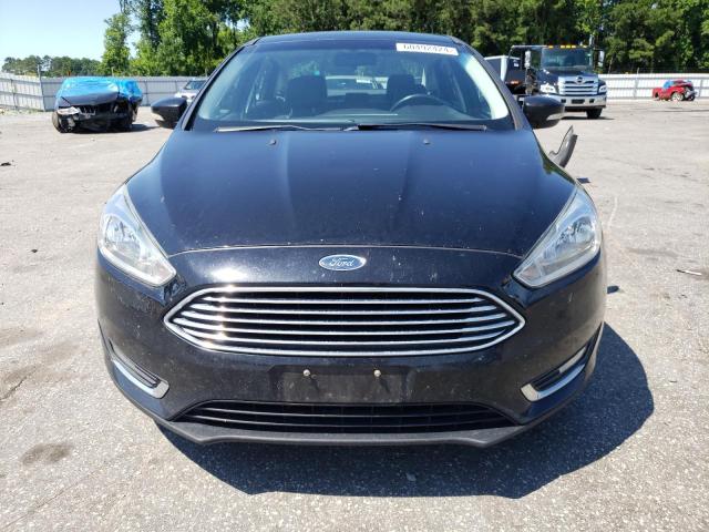 Photo 5 from auction – 2016 FORD FOCUS TITA with VIN 1FADP3J27GL361948