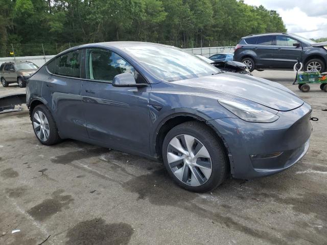 Photo 4 from auction – 2023 TESLA MODEL Y with VIN 7SAYGDED6PF935135