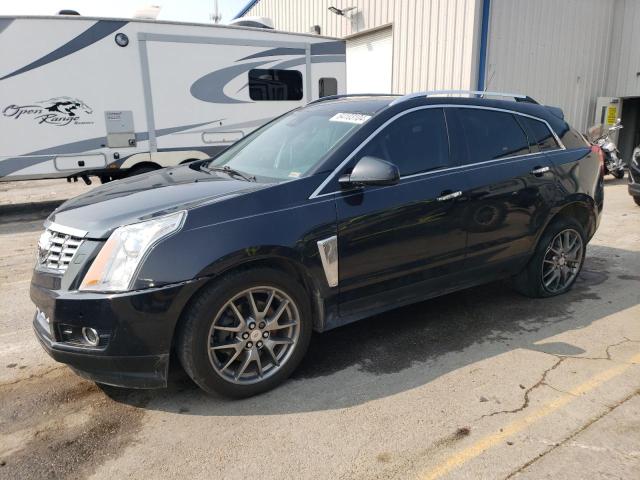 CADILLAC SRX PREMIU 2014 with VIN 3GYFNDE39ES569946 - Photo from auction