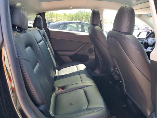 Photo 11 from auction – 2022 TESLA MODEL Y with VIN 7SAYGDEE6NA016304