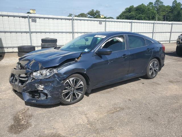 HONDA CIVIC EXL 2018 with VIN JHMFC1F75JX040304 - Photo from auction