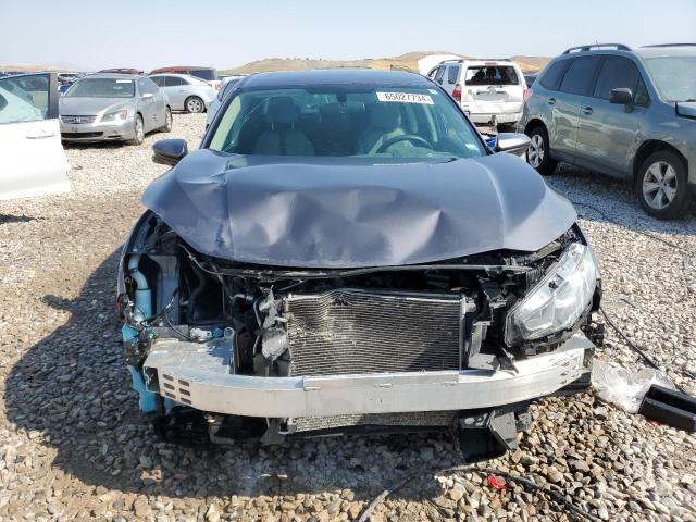 Photo 5 from auction – 2018 HONDA CIVIC EX with VIN 19XFC2F78JE006316