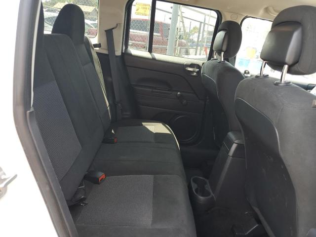 Photo 11 from auction – 2014 JEEP PATRIOT SP with VIN 1C4NJPBA2ED857034