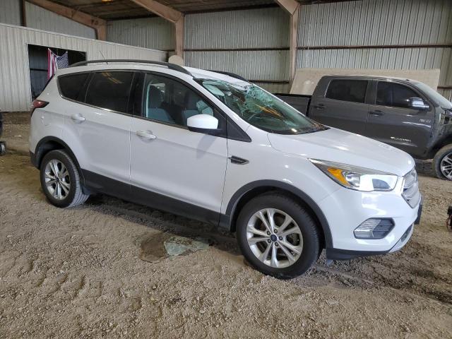 Photo 4 from auction – 2018 FORD ESCAPE S with VIN 1FMCU0GD8JUB16014