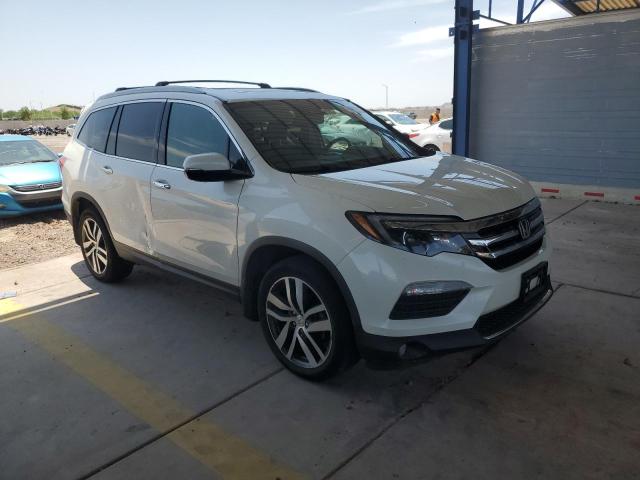 Photo 4 from auction – 2016 HONDA PILOT ELIT with VIN 5FNYF6H08GB062878
