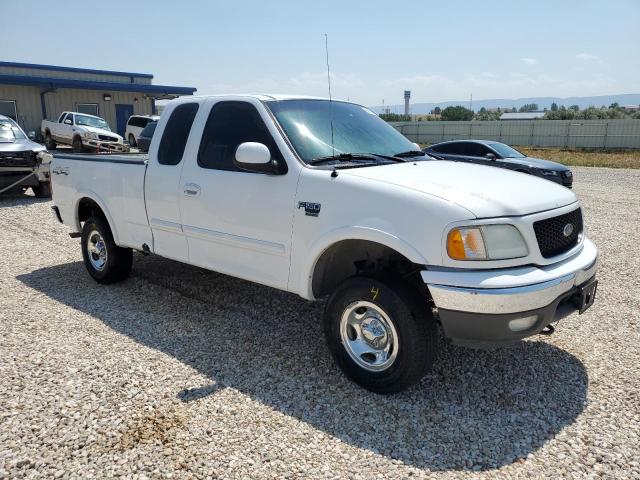 Photo 4 from auction – 2002 FORD F150 with VIN 1FTRX18W22NA61275