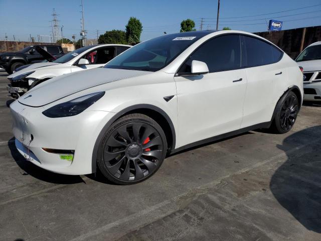 TESLA MODEL Y 2023 with VIN 7SAYGDEF8PF803463 - Photo from auction