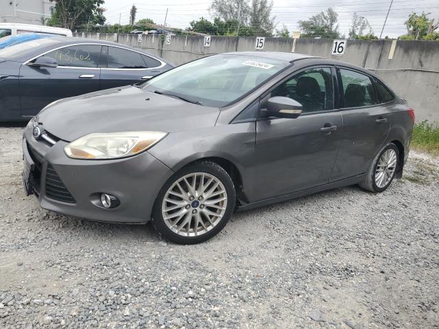 FORD FOCUS SE 2014 with VIN 1FADP3F23EL122290 - Photo from auction