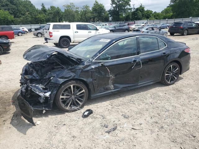 TOYOTA CAMRY 2020 with VIN 4T1K61AK9LU906038 - Photo from auction