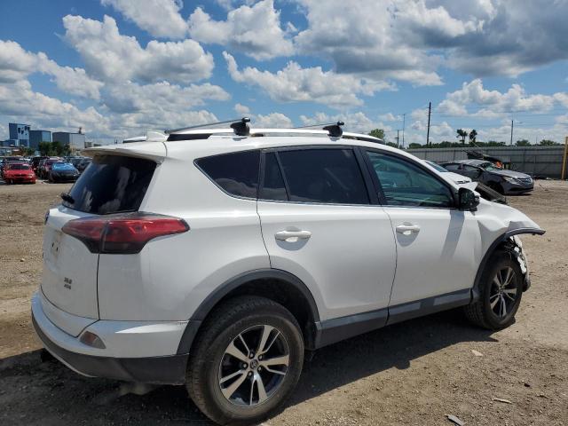 Photo 3 from auction – 2016 TOYOTA RAV4 XLE with VIN 2T3RFREV3GW447359