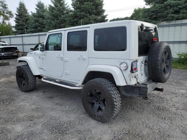 Photo 2 from auction – 2011 JEEP WRANGLER U with VIN 1J4HA5H17BL576996