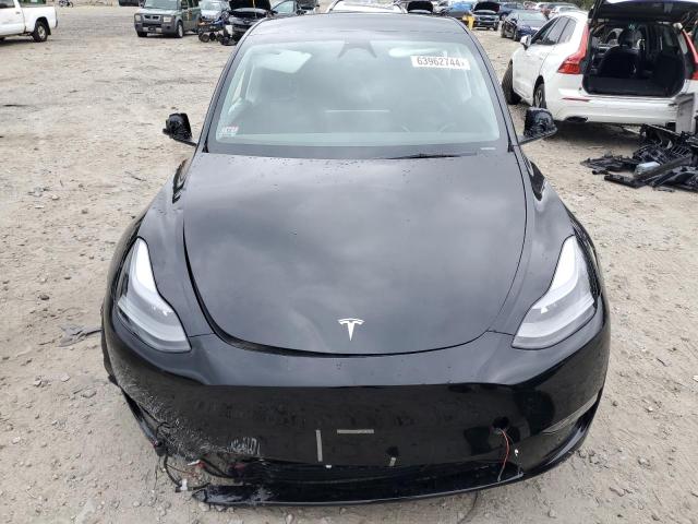 Photo 5 from auction – 2023 TESLA MODEL Y with VIN 7SAYGDEEXPA203032