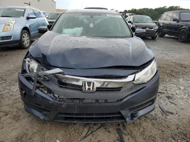 Photo 5 from auction – 2018 HONDA CIVIC EX with VIN 19XFC2F70JE001451