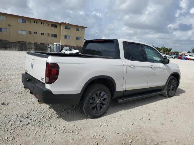 Photo 3 from auction – 2023 HONDA RIDGELINE with VIN 5FPYK3F17PB044403