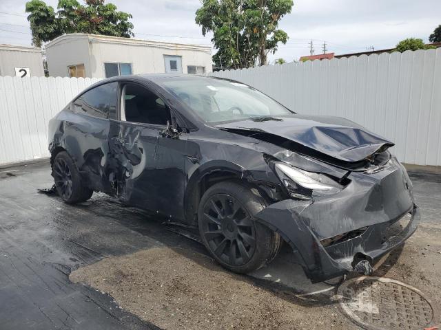 Photo 4 from auction – 2023 TESLA MODEL Y with VIN 7SAYGDEE3PA044208