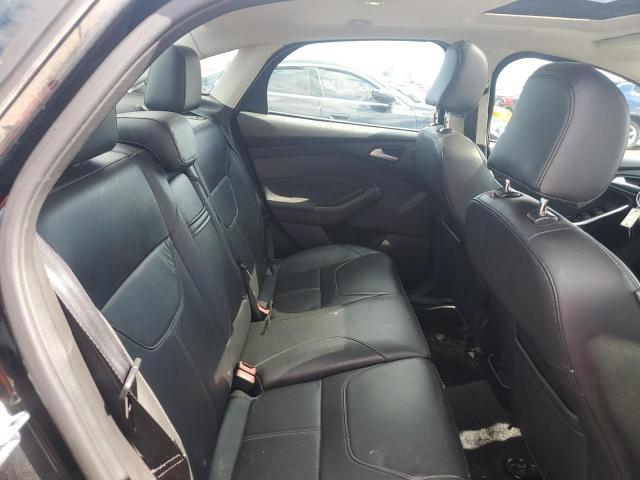 Photo 10 from auction – 2015 FORD FOCUS TITA with VIN 1FADP3J20FL216569
