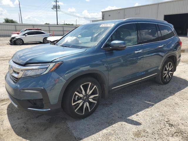 Photo 1 from auction – 2021 HONDA PILOT TOUR with VIN 5FNYF5H97MB019234