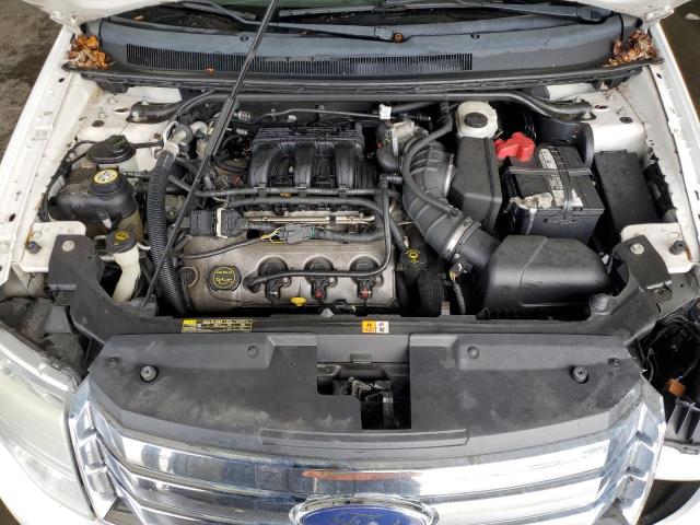 Photo 12 from auction – 2008 FORD TAURUS X S with VIN 1FMDK05W58GA12877