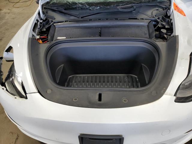 Photo 11 from auction – 2022 TESLA MODEL Y with VIN 7SAYGAEE3NF546991
