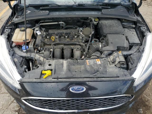 Photo 11 from auction – 2016 FORD FOCUS SE with VIN 1FADP3K29GL218370