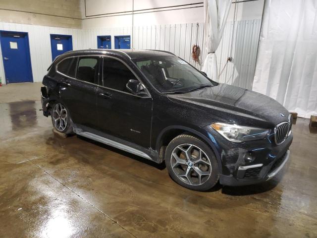 Photo 4 from auction – 2018 BMW X1 XDRIVE2 with VIN WBXHT3C30J5F89434