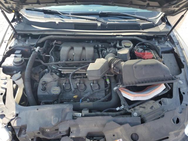 Photo 11 from auction – 2015 FORD TAURUS POL with VIN 1FAHP2L88FG144185