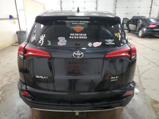 Photo 6 from auction – 2017 TOYOTA RAV4 XLE with VIN 2T3RFREV8HW591068