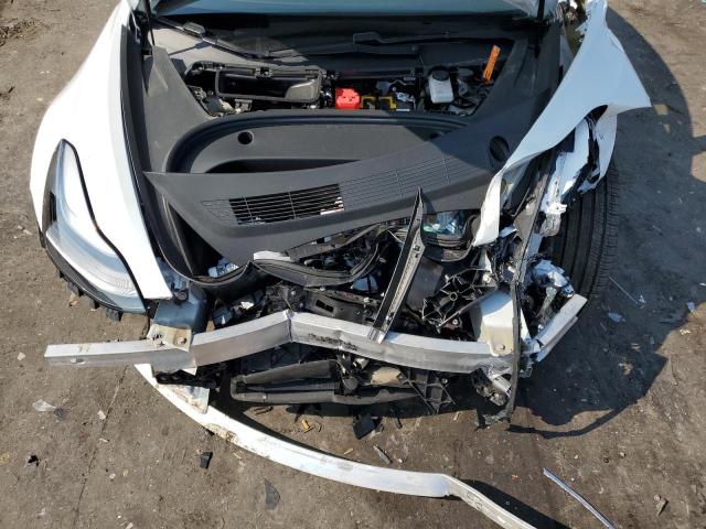 Photo 11 from auction – 2021 TESLA MODEL 3 with VIN 5YJ3E1EAXMF031639