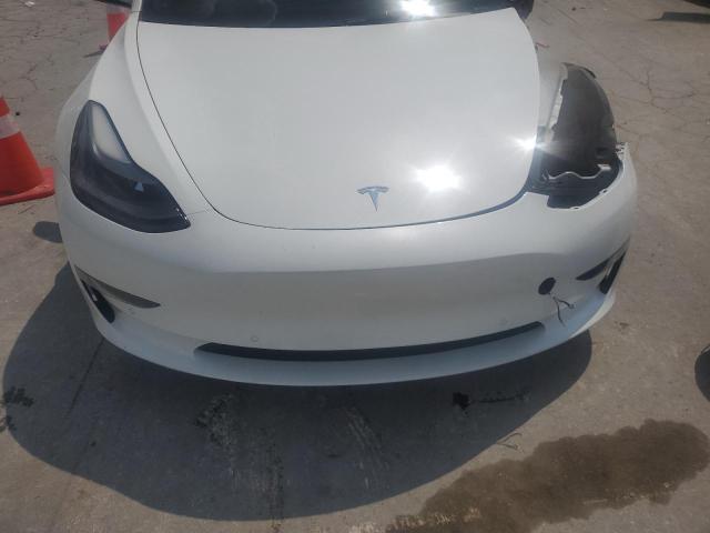 Photo 11 from auction – 2021 TESLA MODEL 3 with VIN 5YJ3E1EB2MF092007