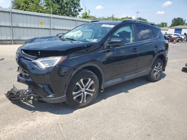 TOYOTA RAV4 LE 2018 with VIN 2T3BFREV0JW839899 - Photo from auction