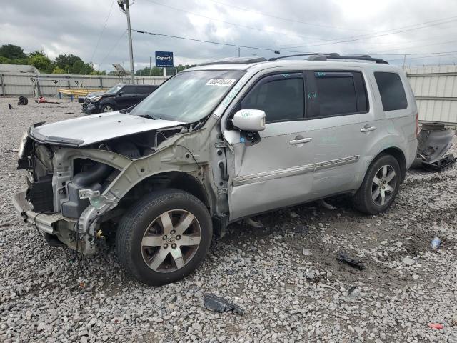 HONDA PILOT TOUR 2012 with VIN 5FNYF4H94CB050532 - Photo from auction