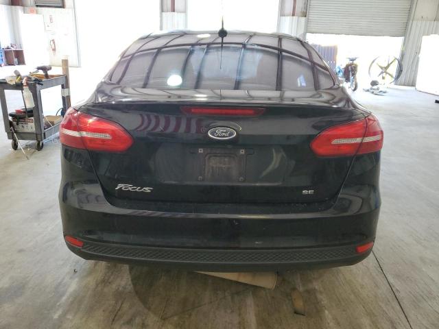 Photo 6 from auction – 2018 FORD FOCUS SE with VIN 1FADP3F25JL223096