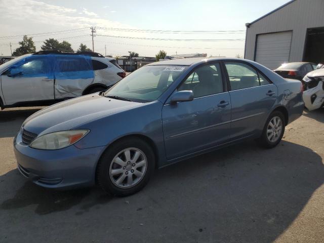 TOYOTA CAMRY LE 2002 with VIN JTDBE32K820134073 - Photo from auction