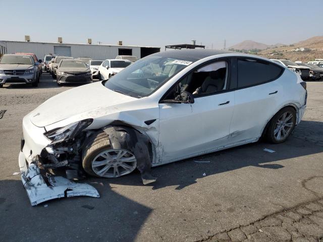 TESLA MODEL Y 2023 with VIN 7SAYGDEE5PA136839 - Photo from auction