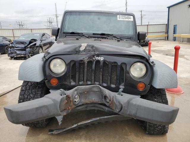 Photo 5 from auction – 2011 JEEP WRANGLER U with VIN 1J4BA6H11BL634256
