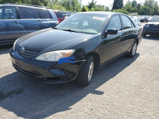 TOYOTA CAMRY LE 2002 with VIN JTDBE32K920039957 - Photo from auction